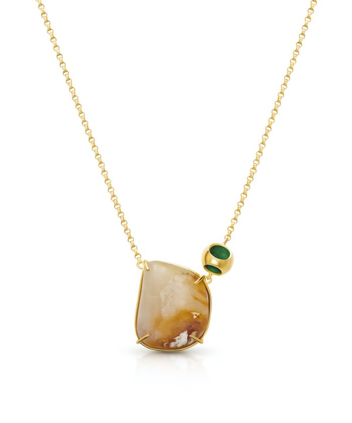 Delicate moonstone pendant necklace by Monica Varela with gold chain, perfect for elegant jewelry lovers.