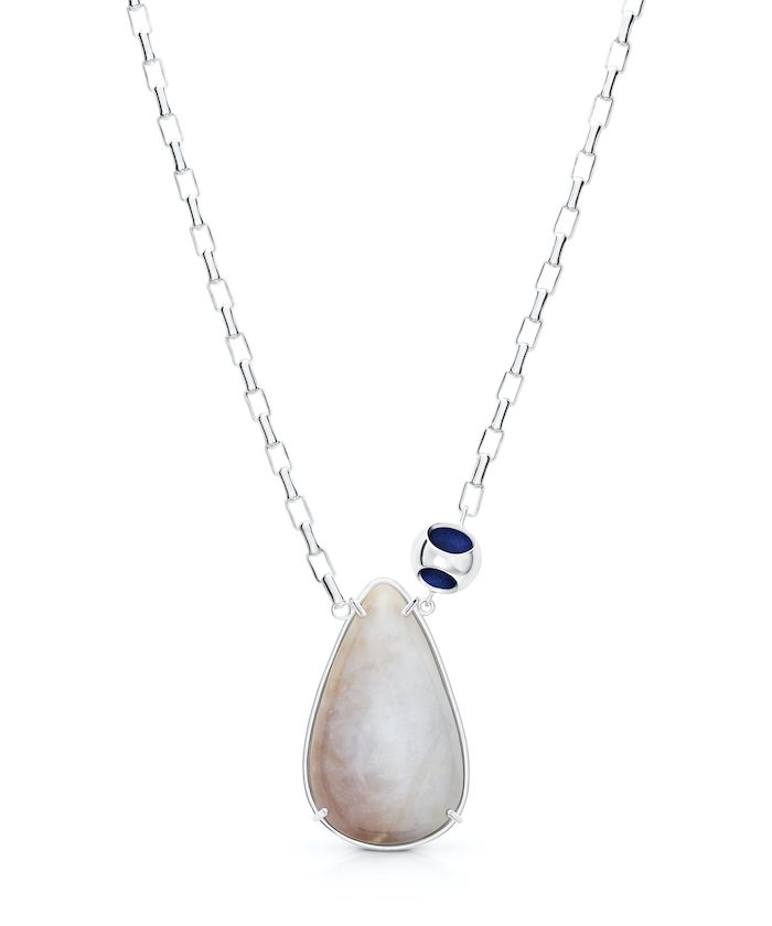 Delicate silver chain with elegant moonstone and navy accents. Perfect for stylish, dainty jewelry lovers.
