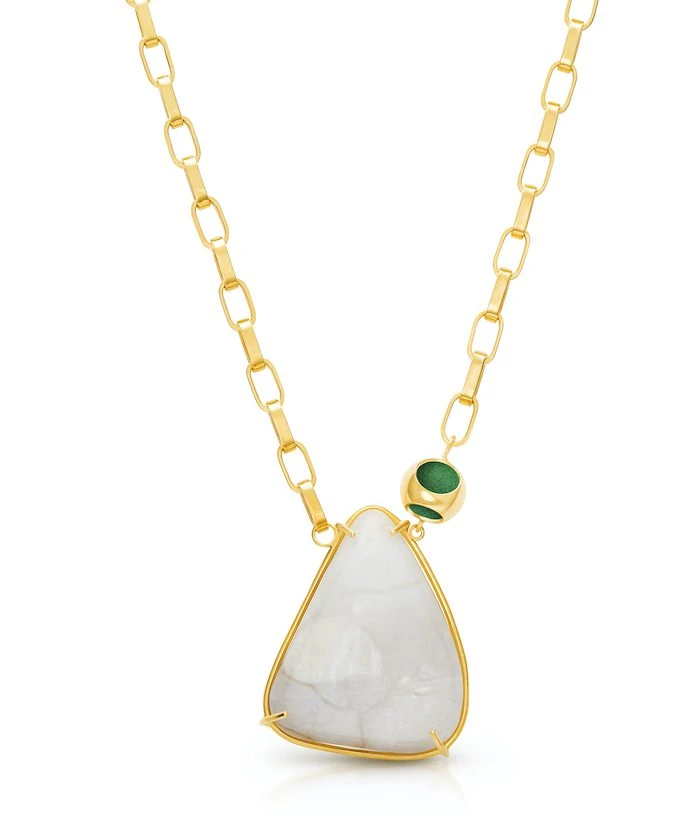 Delicate gold chain with a large moonstone pendant and green accent bead, perfect for sophisticated jewelry lovers.