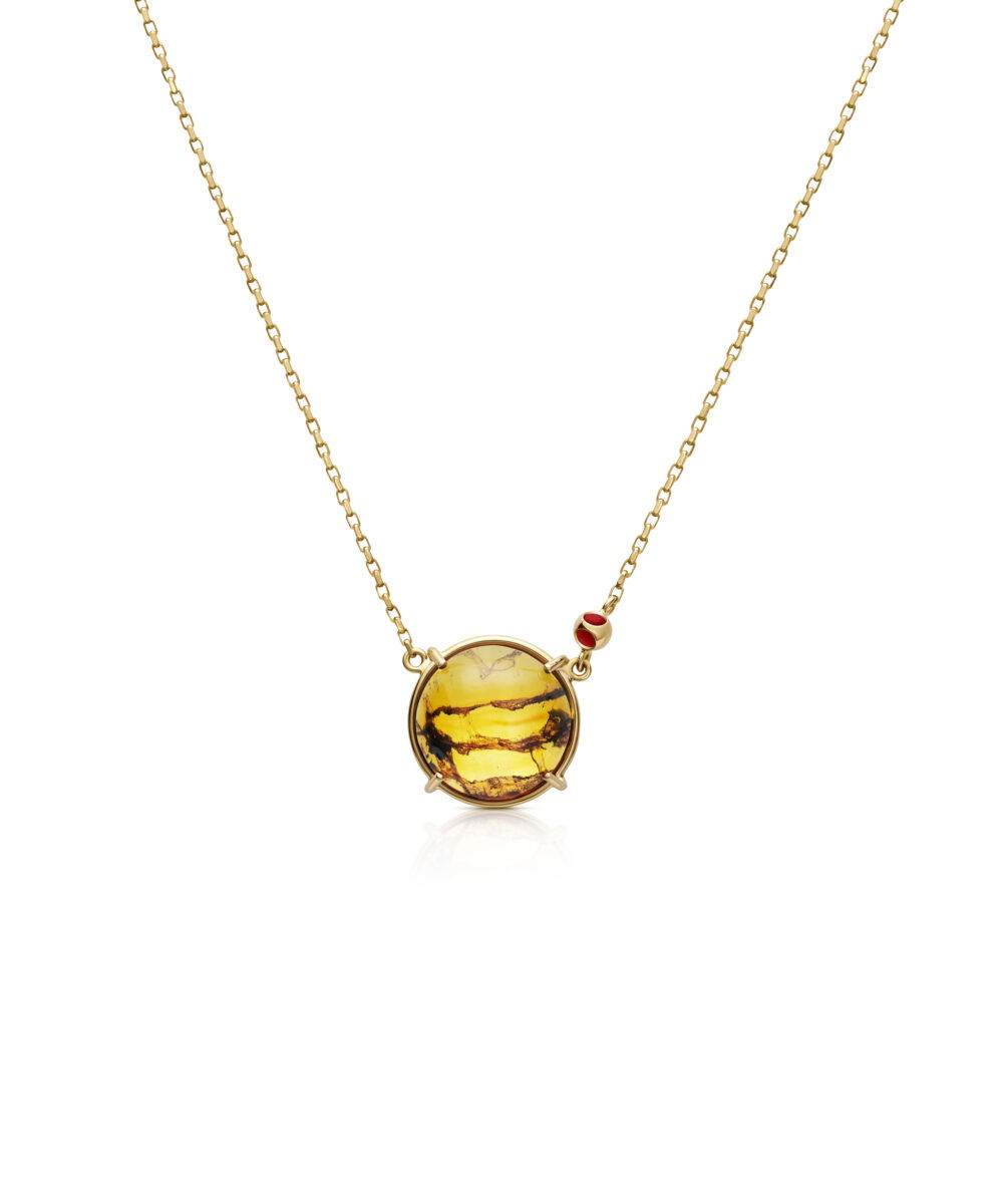 Elegant amber circle pendant on gold chain, perfect for everyday luxury and standout jewelry.