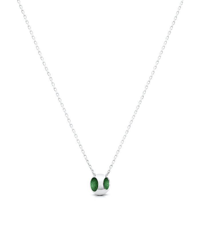 Delicate sterling silver pendant with jazzy green accents and platinum micron plating. Perfect for elegant jewelry styles.