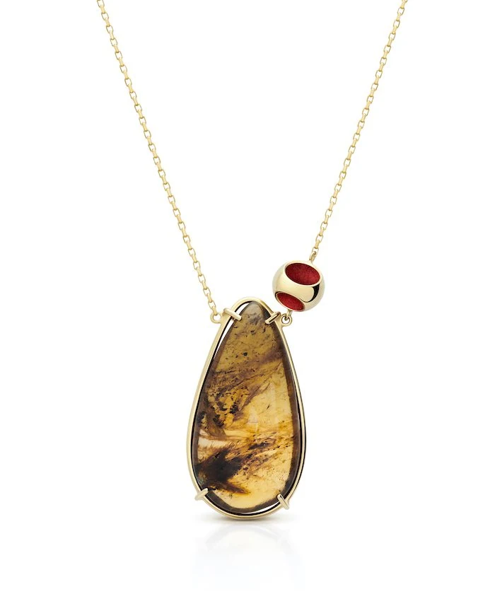 Elegant amber necklace with red and gold accents for a sophisticated look. Perfect jewelry gift for special occasions.