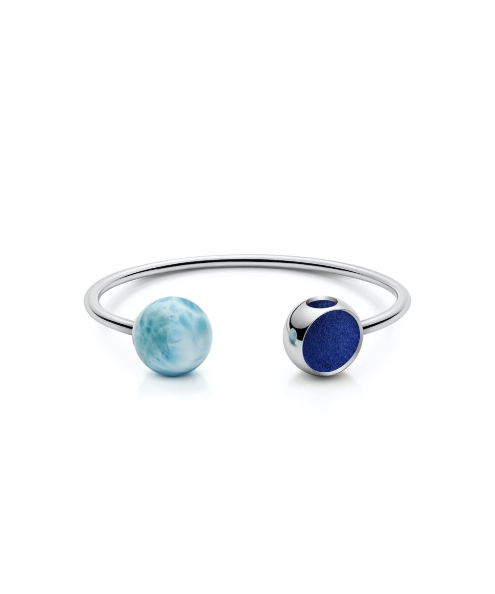 Sterling silver bangle with Larimar and Blue Goldstone accents.