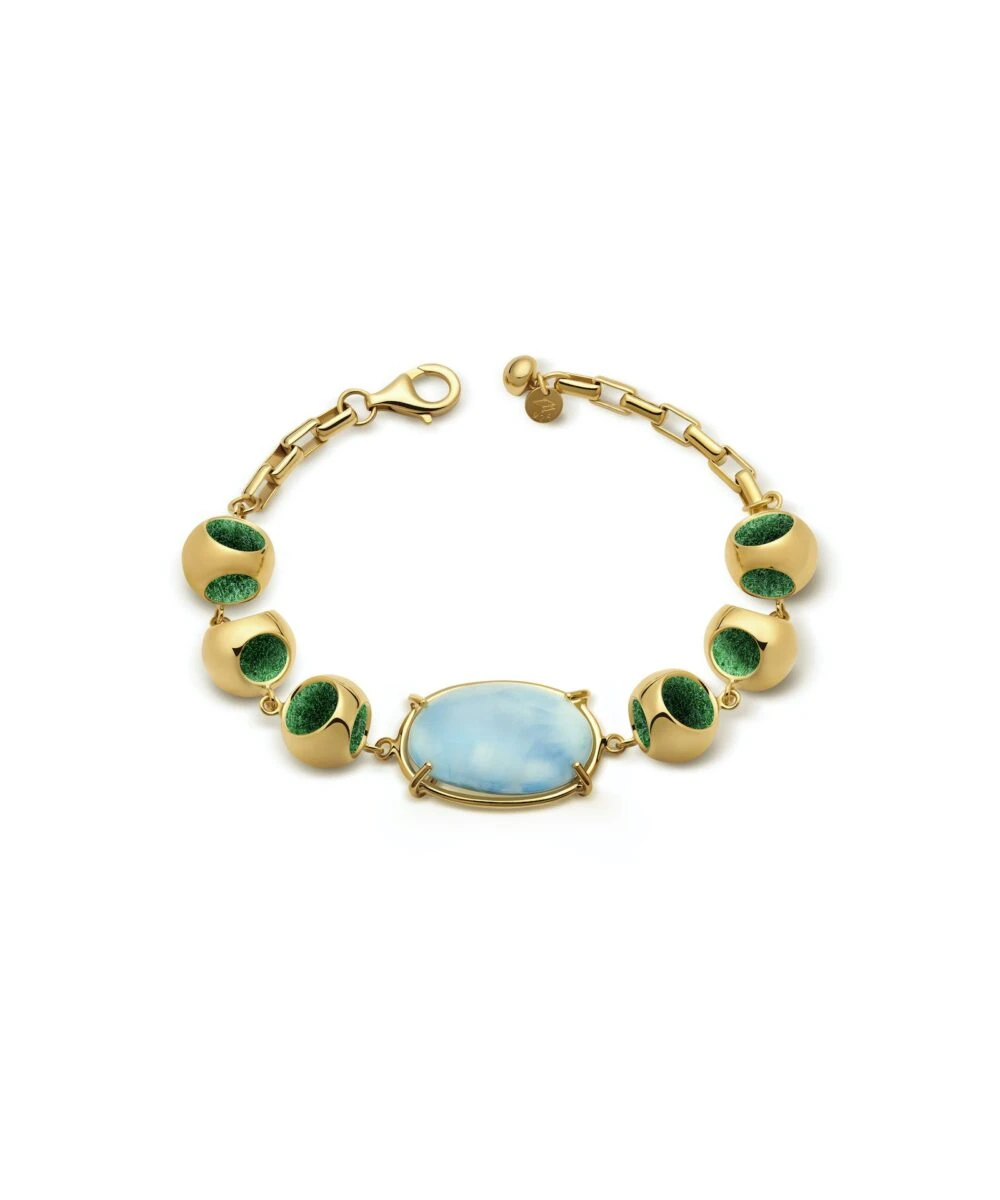 Elegant gold bracelet with Larimar and green accents.