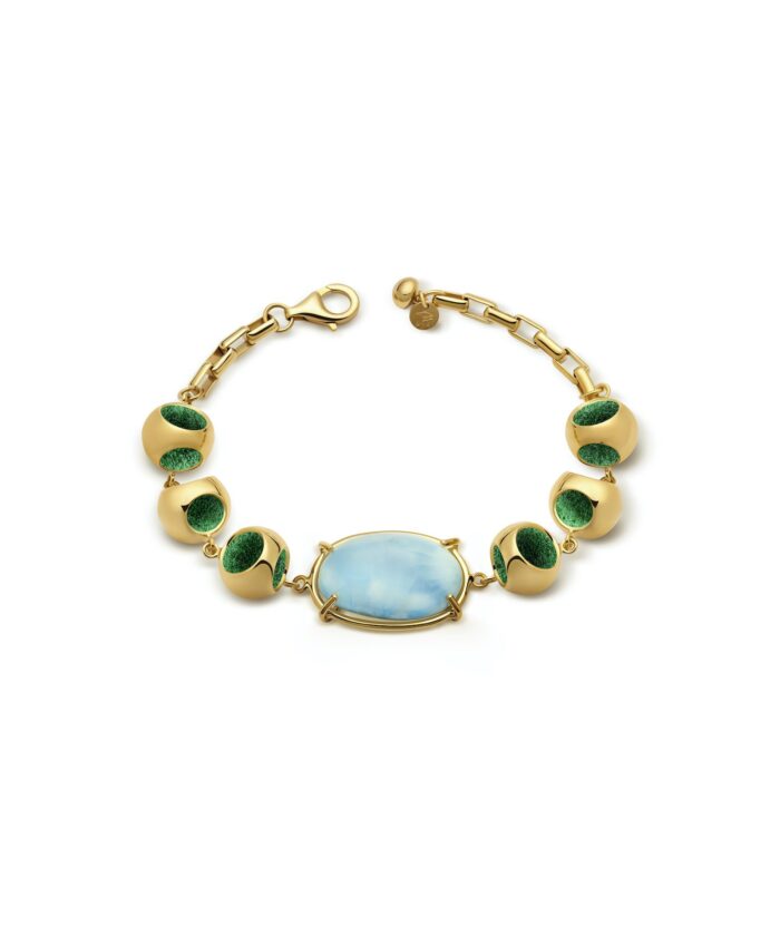 Elegant gold bracelet with Larimar and green accents.