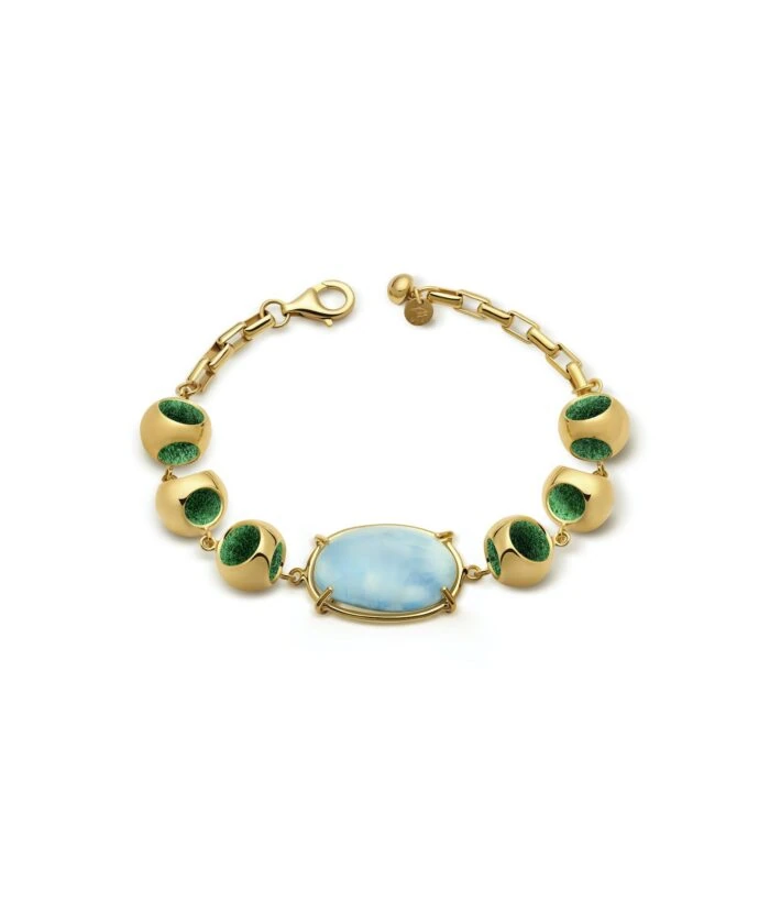 Elegant gold bracelet with Larimar and green accents.