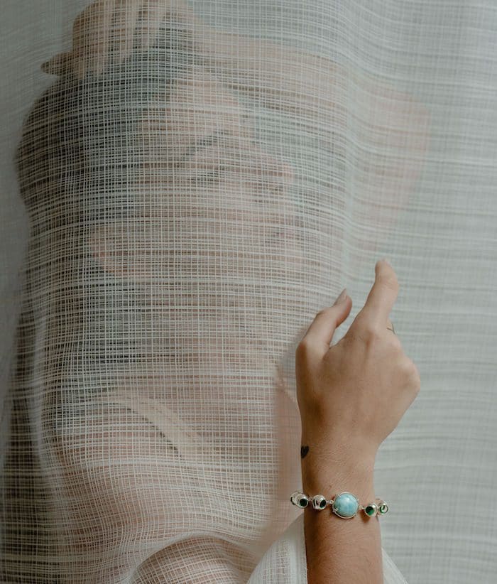 Delicate Larimar infinity bracelet featuring silver accents, ideal for stylish jewelry lovers.