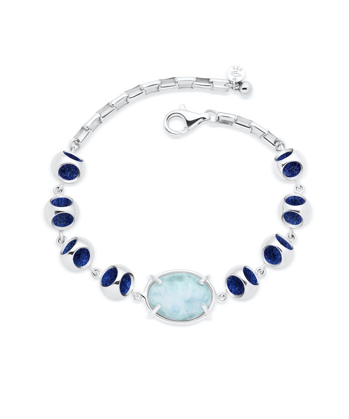 Stunning Larimar bracelet featuring silver infinity design and vibrant blue enamel detail. Perfect for elegant jewelry lovers.