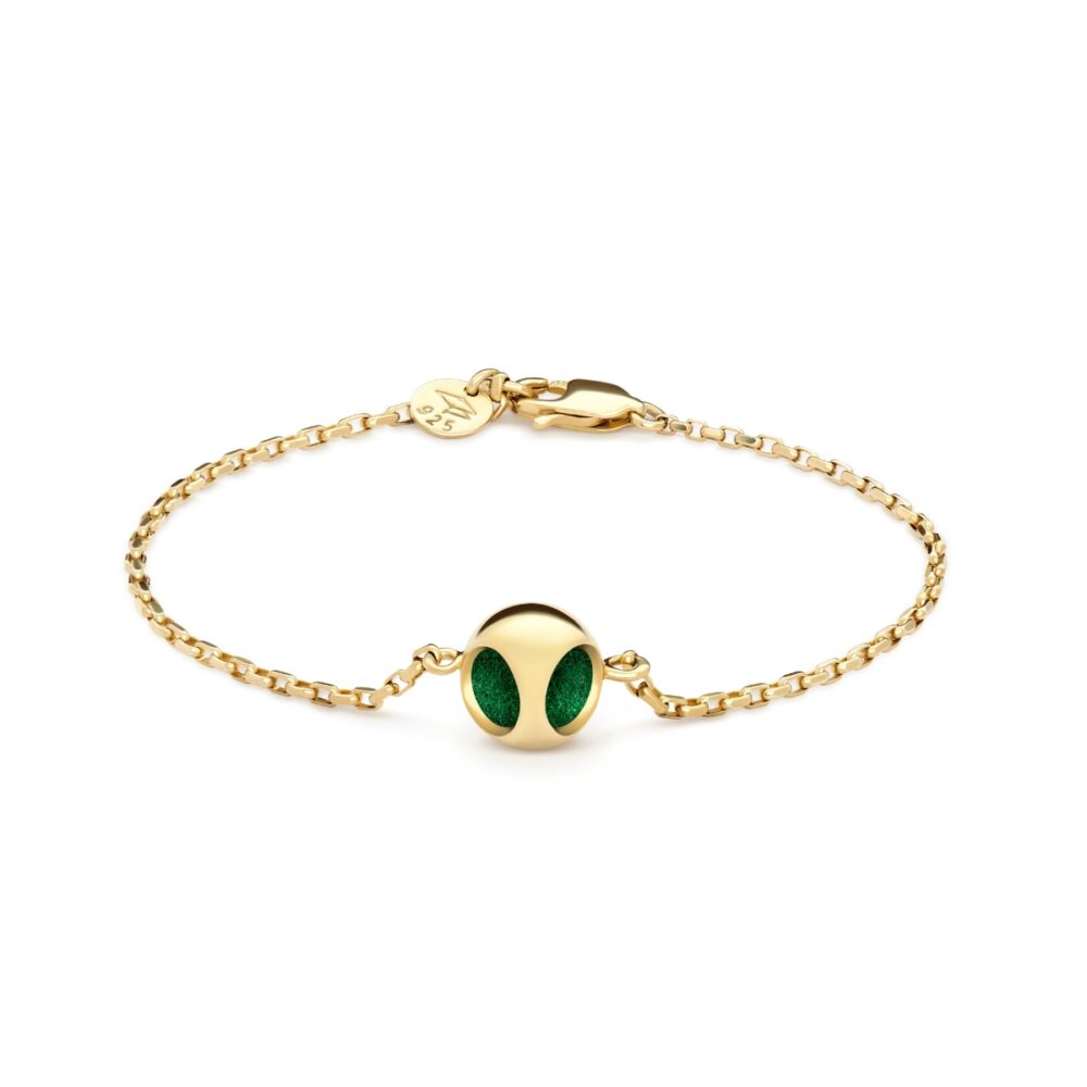 Glamorous gold bracelet featuring a cute, eye-catching alien head charm with sparkling green accents, perfect for style and uniqueness.