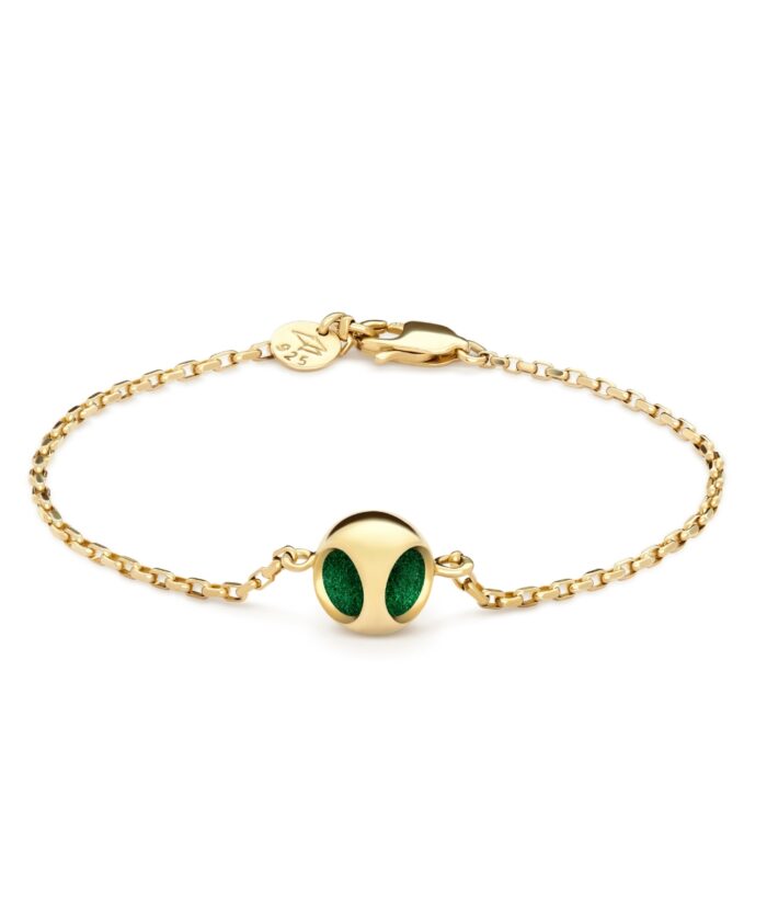 Glamorous gold bracelet featuring a cute, eye-catching alien head charm with sparkling green accents, perfect for style and uniqueness.