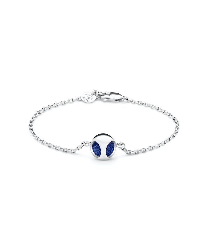 Elegant silver bracelet with a blue spinel bead charm, perfect for minimalistic jewelry lovers.