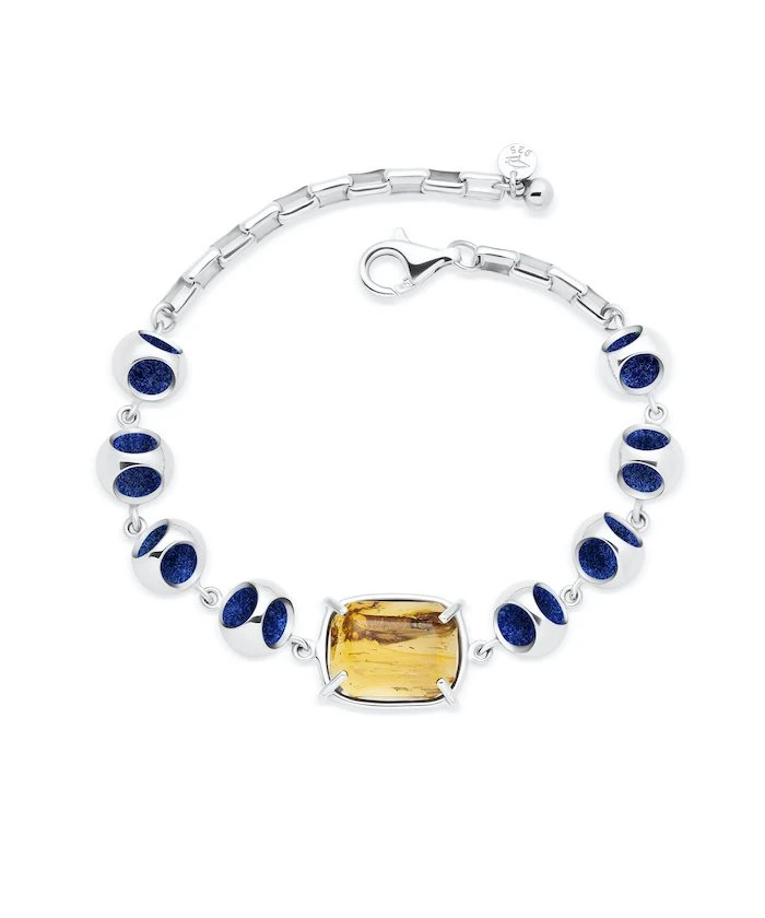 Verged Amber bracelet with blue and silver accents, perfect for stylish accessories.