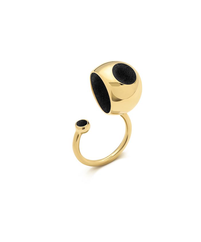 Elegant gold ring with black details inspired by sole design, perfect for fashion-forward accessories.