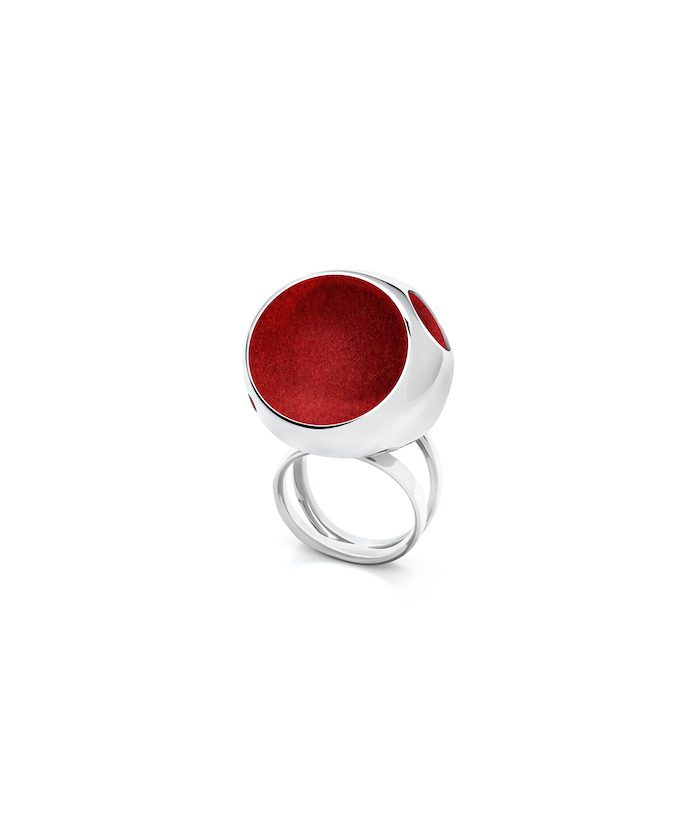 Large statement ring with deep red velvet interior and silver band. Perfect for fashionable accessories.