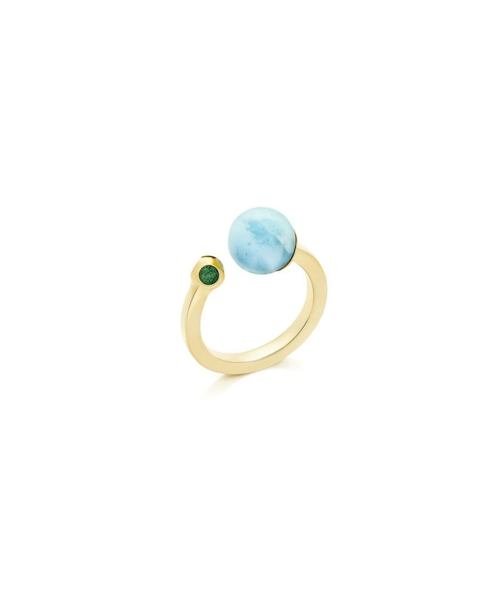 Delicate Larimar ring with gold band and green accent stones, perfect for elegant jewelry lovers.