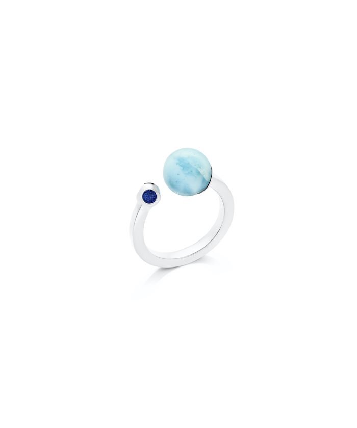 Elegant sterling silver ring with a moonstone and sapphire accents, perfect for jewelry lovers.