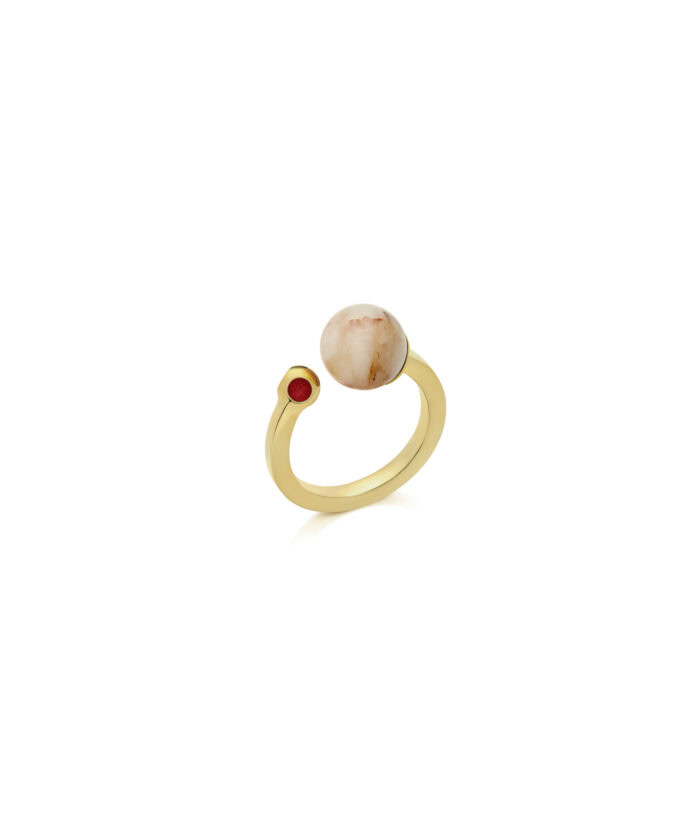 Elegant gold ring with natural moonstone and red gemstone detail for women.