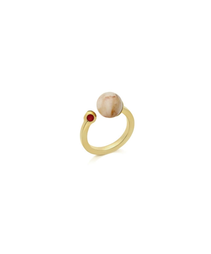 Elegant gold ring with natural moonstone and red gemstone detail for women.