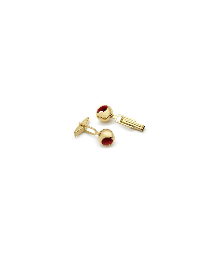 Elegant gold cufflinks with red accents for men's formal wear.