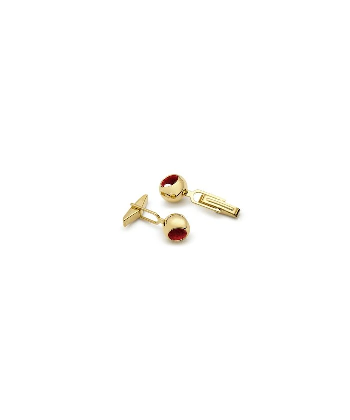 Elegant gold cufflinks with red accents for men's formal wear.