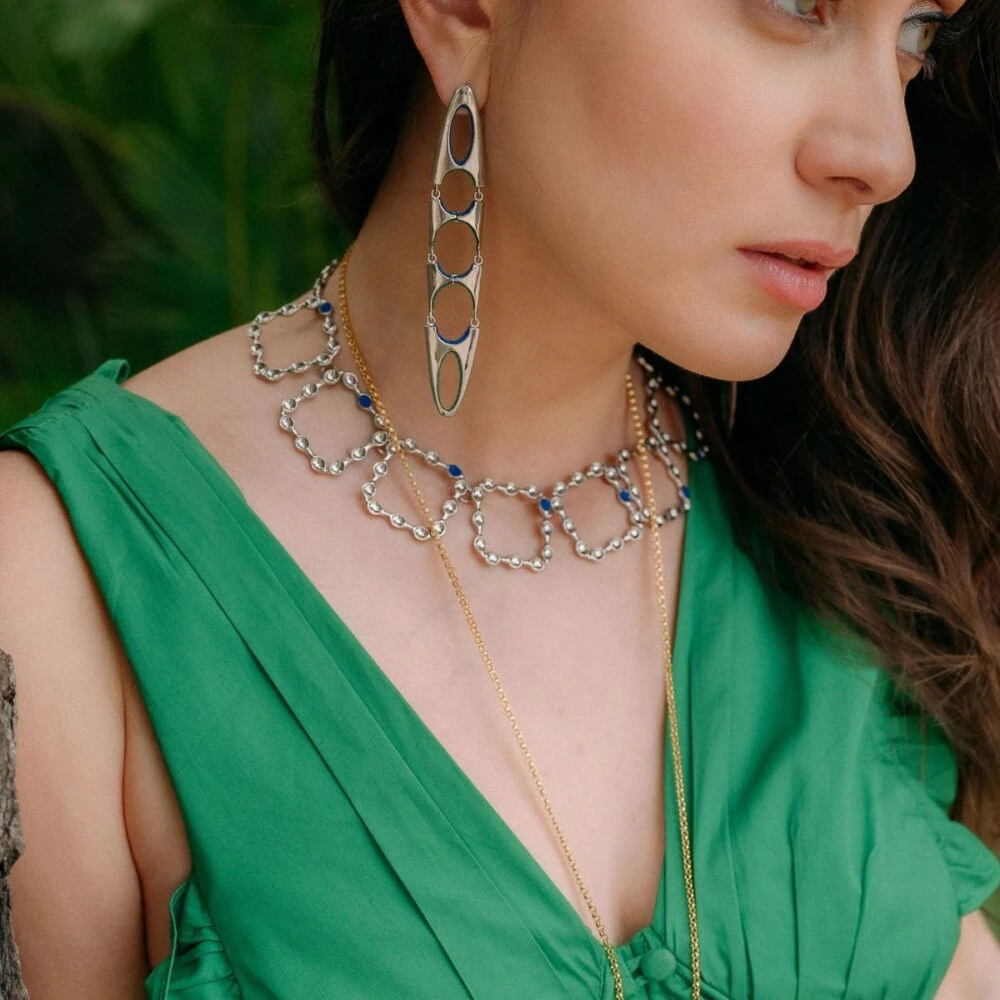 Elegant silver and blue gemstone eternity choker necklace for women. Perfect for stylish accessories and jewelry lovers.