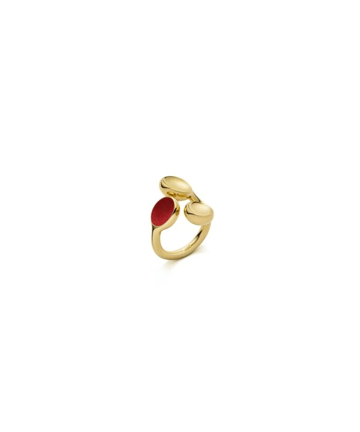 Elegant gold ring with red enamel accents, perfect for stylish occasions.