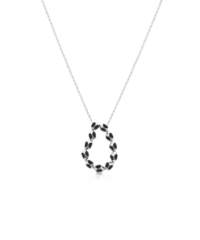 Stylish silver necklace featuring a circular pendant adorned with black details, perfect for modern jewelry lovers.