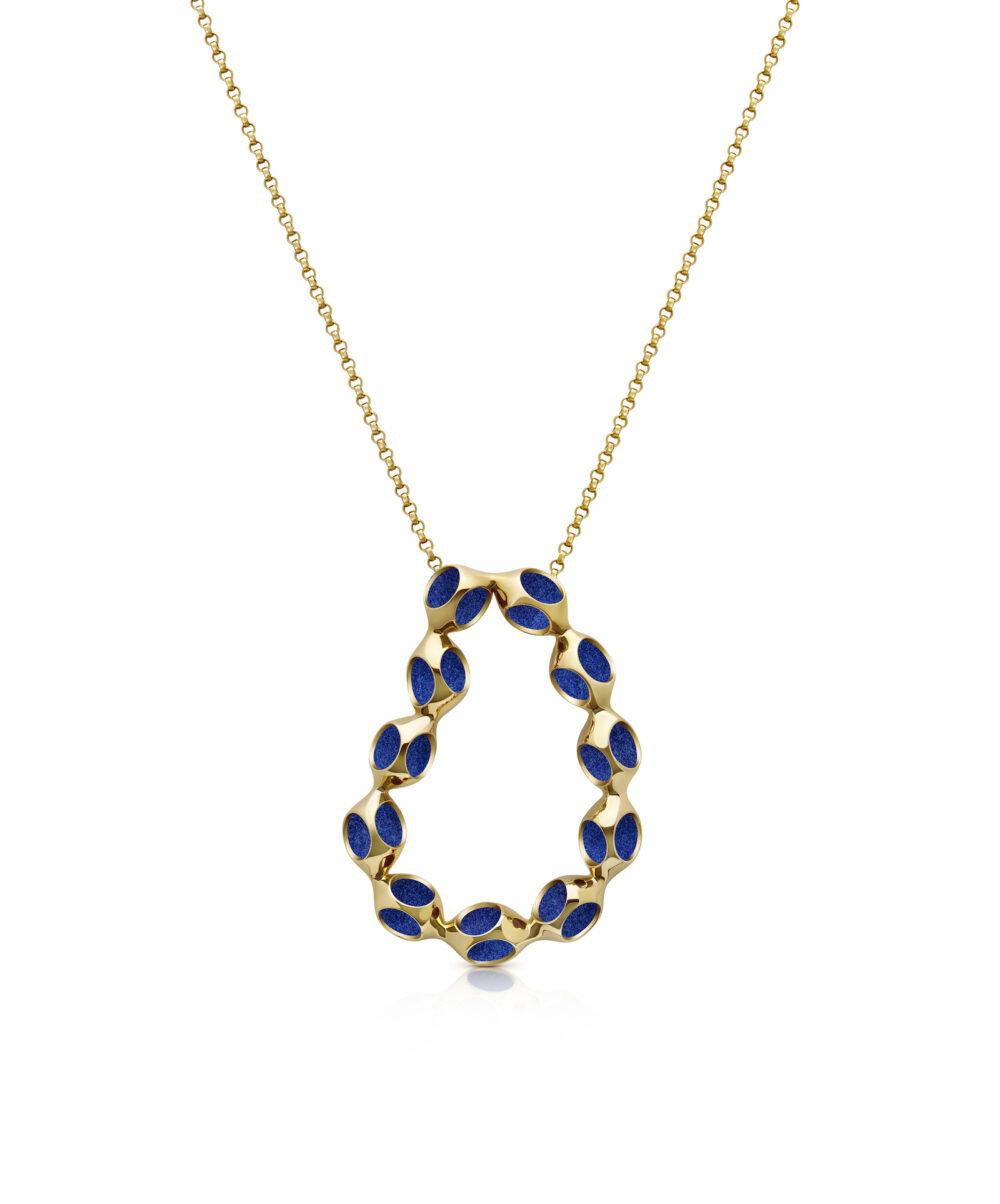 A stunning gold necklace featuring a delicate chain and a unique oval design with vibrant blue enamel accents. Perfect for sophisticated style.
