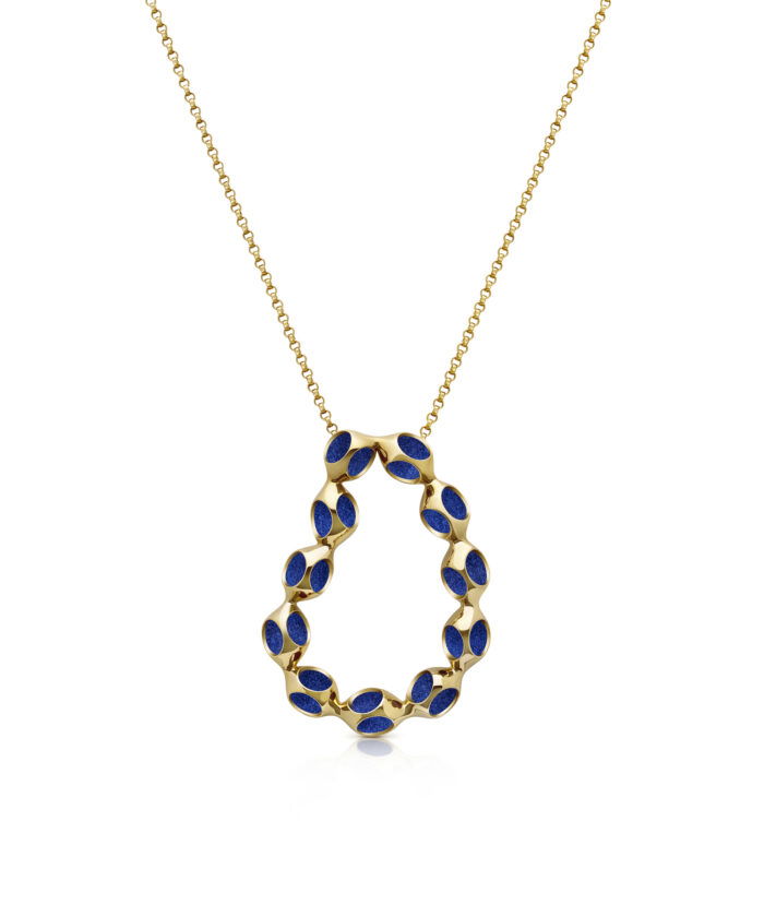 A stunning gold necklace featuring a delicate chain and a unique oval design with vibrant blue enamel accents. Perfect for sophisticated style.