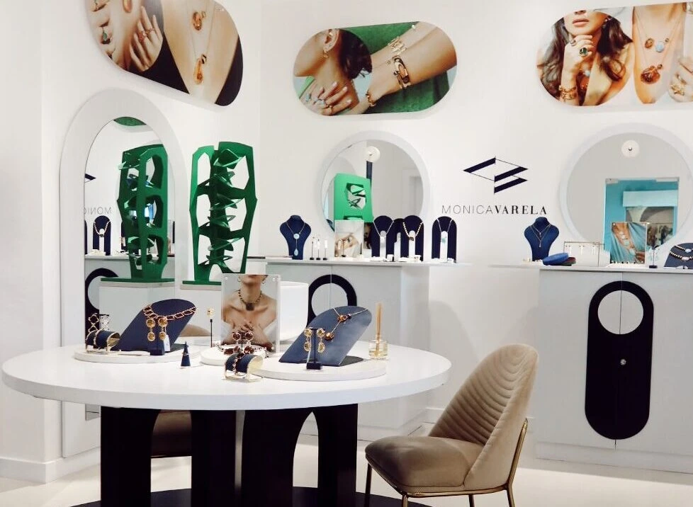 Elegant jewelry boutique display with necklaces and accessories showcased.