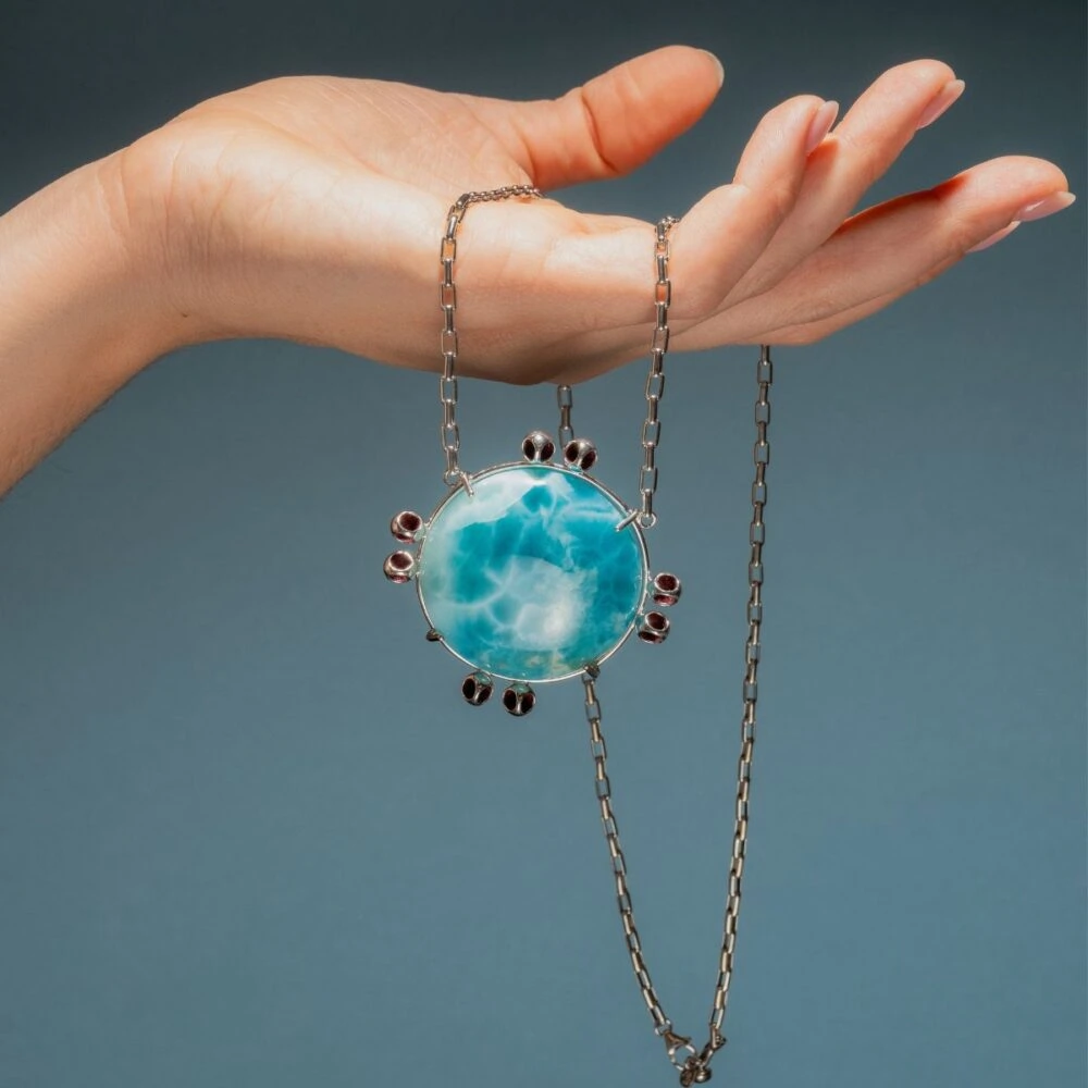 Delicate larimar earrings with silver accents, perfect for elegant beach or summer styles.