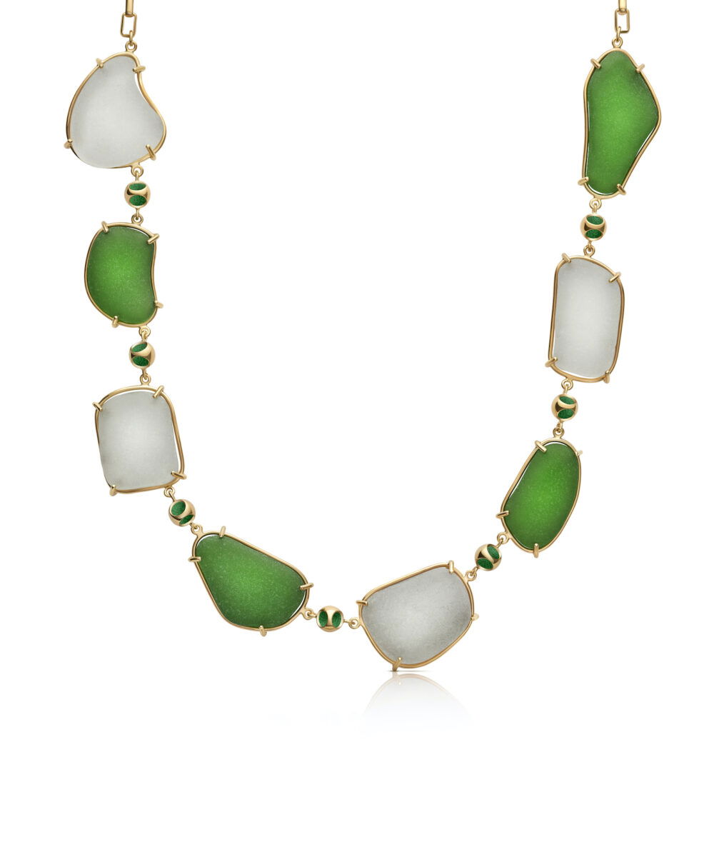 Elegant ocean-inspired jewelry with green and white sea glass accents. Perfect for summer style.
