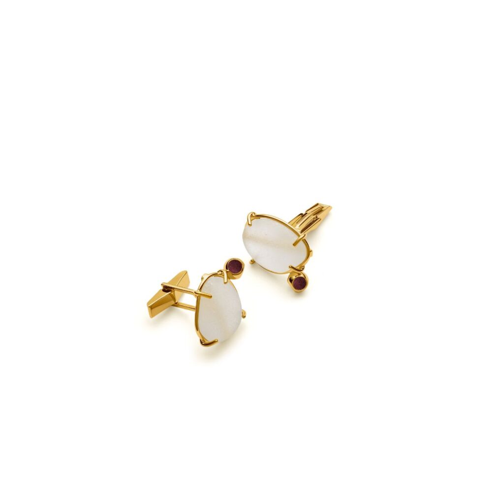 Elegant gold cufflinks with white seaglass and deep red accents for sophisticated style.