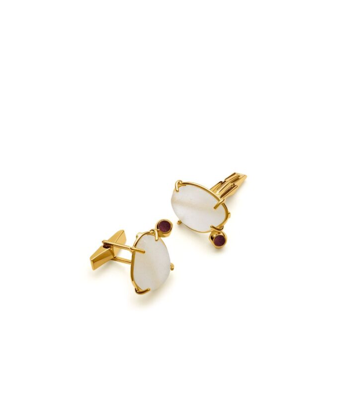 Elegant gold cufflinks with white seaglass and deep red accents for sophisticated style.