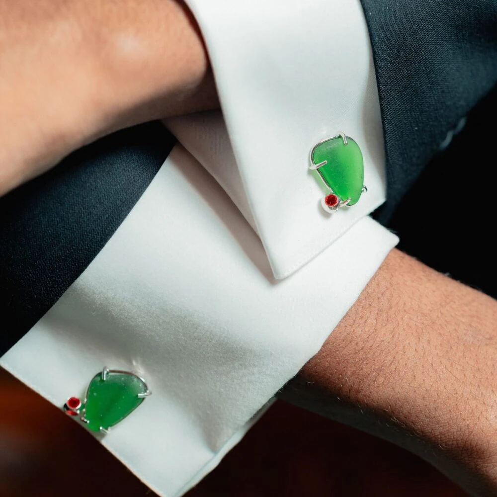 Elegant green seaglass cufflinks with silver setting, perfect for formal occasions. Stylish men's accessories for a sophisticated look.