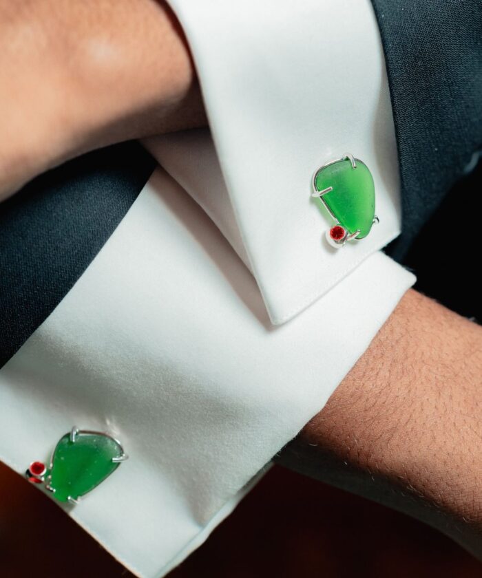 Elegant green seaglass cufflinks with silver setting, perfect for formal occasions. Stylish men's accessories for a sophisticated look.