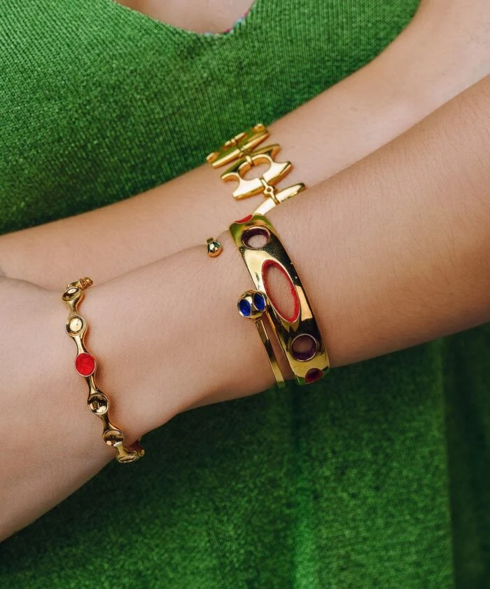 EvelynAnn gold cuff bracelet with colorful cutout design, perfect for stylish accessories.