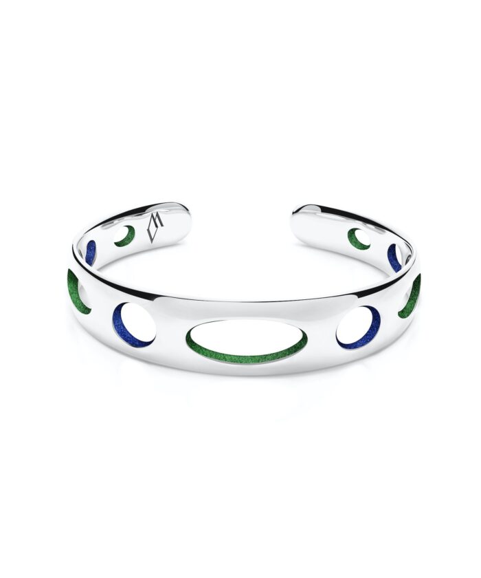 Elegant silver cuff bracelet with green and blue enamel circles, modern accessory for stylish outfits.