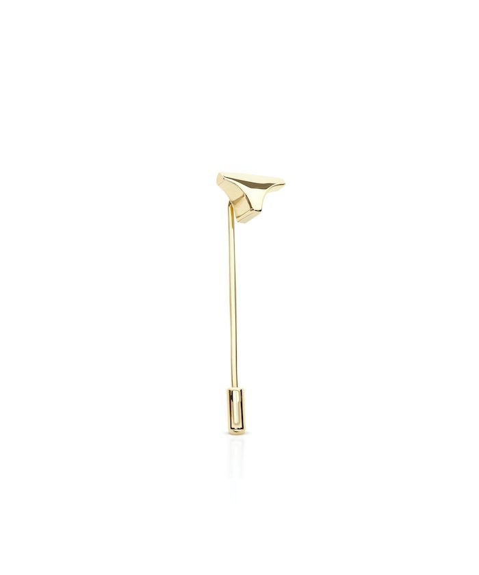 Gold decorative lapel pin for fashion and accessories.