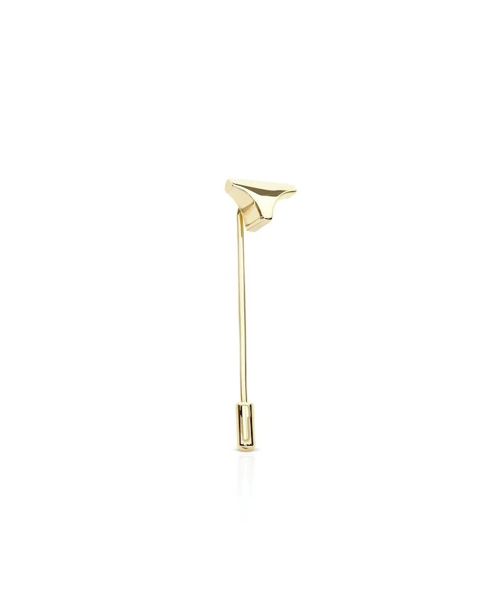 Gold decorative lapel pin for fashion and accessories.