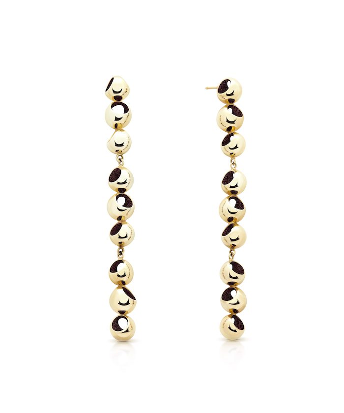 Earrings with black and white patterned beads, dangle style for a trendy look.