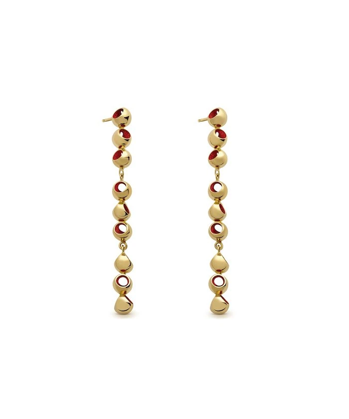 Gold dangle earrings with red accents and modern design for women.