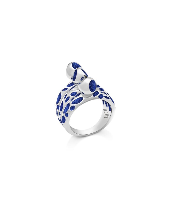 Stunning silver ring featuring mosaic-inspired blue enamel design, perfect for stylish jewelry lovers.