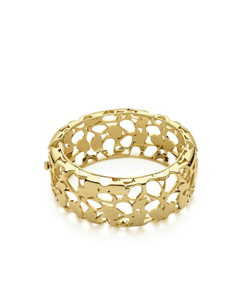 Gold floral-inspired jewelry bangle for women and girls. Elegant accessory for special occasions and daily wear.