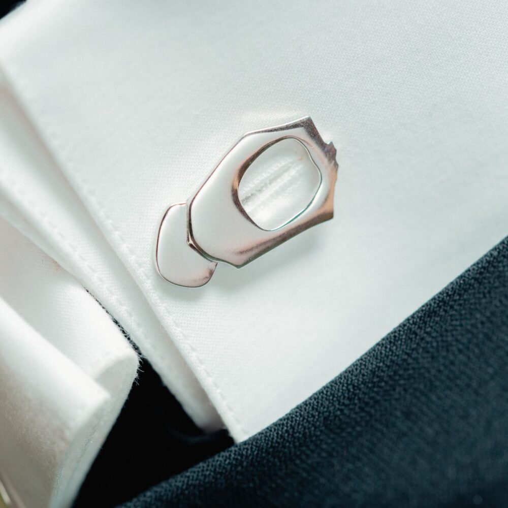 Sophisticated silver cufflink with union back closure for dress shirts and tuxedos.