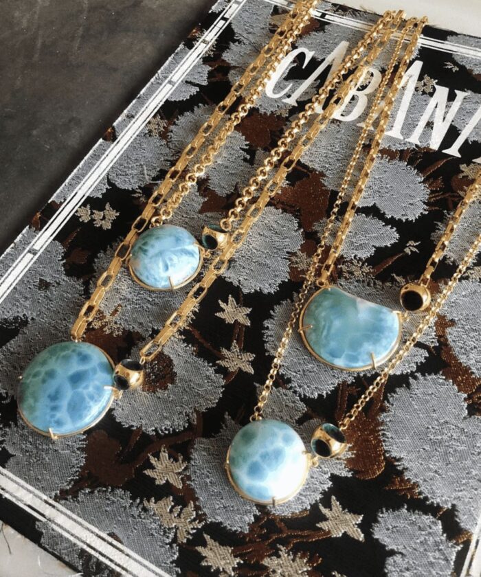 Larimar jewelry necklace with gold chain and blue larimar pendants. Perfect for summer and beach styles.