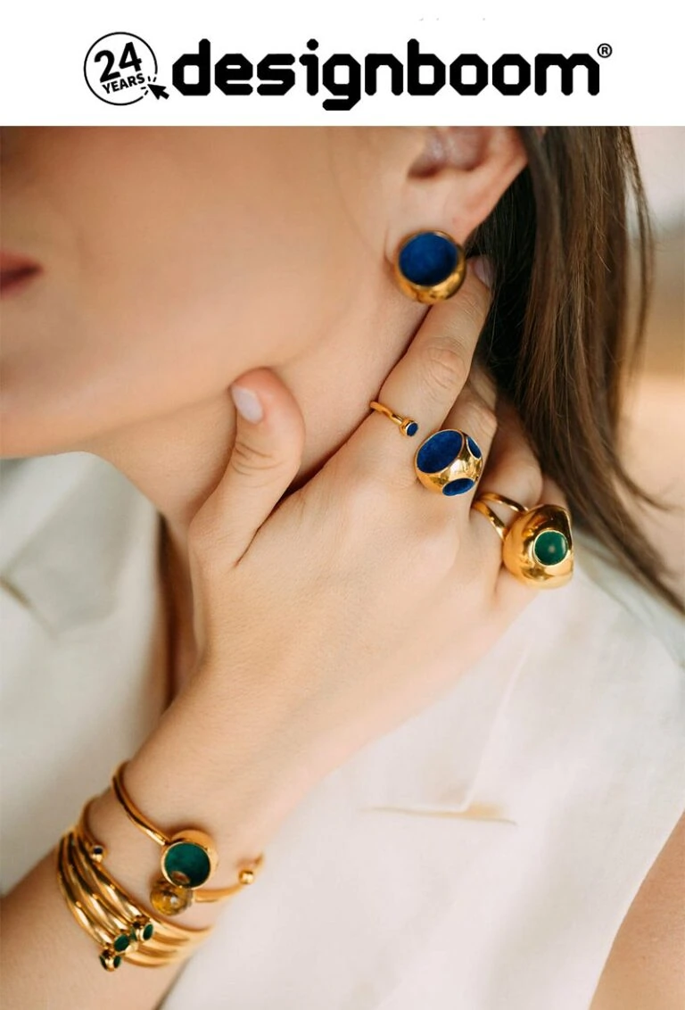 Fashionable jewelry set with gold rings, earrings, and bracelets showcasing tropical style.