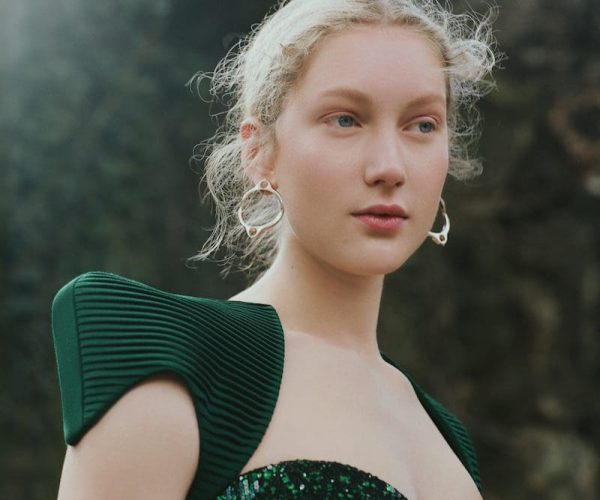 L'Officiel Brasil feature, model in a green sequin dress