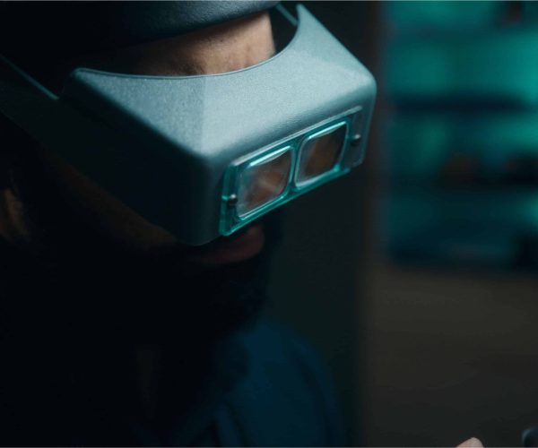 Jeweler working with a magnifying visor in the Monica Varela workshop