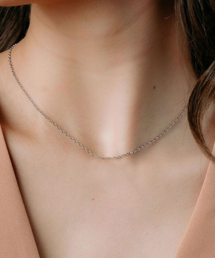 Delicate 16-inch gold chain, perfect for layering and everyday wear. Adds a sleek, sophisticated touch to any outfit.